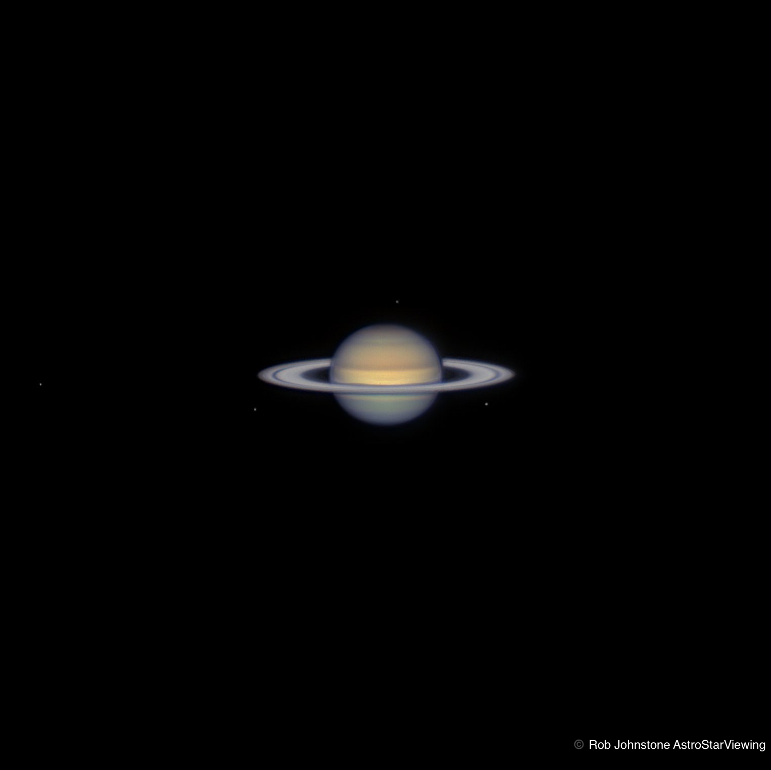 Saturn through a telescope @ Courtesy of Robert Johnstone